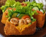 Foto langkah ke 9 dari resep Bread Pocket Seafood Tom Yum.
