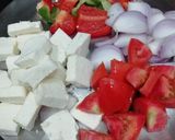A picture of step 1 of Chilli Paneer with red capsicum.