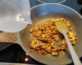 A picture of step 4 of Madurai egg kari dosa.