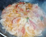 Foto del passaggio 4 della ricetta Calzone capriccioso🧅🍅🧀🥓