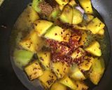 A picture of step 4 of Sweet and sour raw mango.