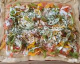Une image de l'étape 4 de Pizza au saumon et poivrons au Cook Expert.