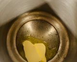 A picture of step 1 of Salty butter popcorn 🍿.