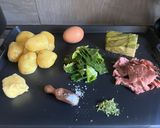 A picture of step 1 of Colcannon with confit egg and peppered beef - Irish mash.