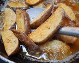 A picture of step 9 of Mexican potato wedges.