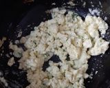 A picture of step 3 of Tortilla Wrap with egg and veggies.