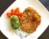 Foto del paso 5 de la receta: Milanesas estilo peruanas a la chapa con buñuelos de acelga y tomates cherrys