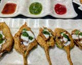 A picture of step 8 of Palak pakoda chaat.