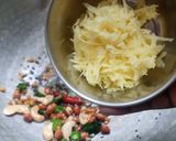 A picture of step 3 of Mamidikaya pulihora or mavinakayi chitrana / Mango rice.
