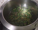 A picture of step 1 of Thai Baby Corn Soup.