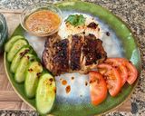 A picture of step 4 of Cambodian grilled chicken over rice.