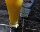 Foto langkah ke 3 dari resep Es Nutrisari Milky Pop.