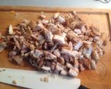 A picture of step 2 of Spaghetti with Rabbit Ragù, Mushrooms, and Walnuts.