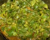 A picture of step 5 of Shimla mirch with achar masala, less ingredients.