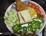 A picture of step 1 of Samosa cheesy sandwich.