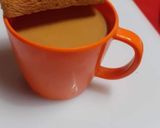 A picture of step 4 of Adrak Elaichi Chai.