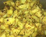 A picture of step 4 of Achari Aloo.
