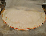 Foto del paso 3 de la receta: Empanada de queso de cabra y rúcula