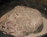 A picture of step 2 of Hearb roasted leg of lamb roll with potatoes and carrots.