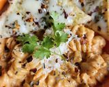 A picture of step 6 of Pink sauce Pasta with Cheesy Garlic Bread.