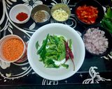 A picture of step 1 of Masoor Dal with Tomato and Curry Leaf Tadka.
