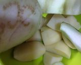 A picture of step 1 of Baingan bhaja.