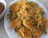 A picture of step 6 of Masala matar pulao.