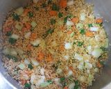 A picture of step 1 of Dalia and Moong Dal Khichdi.
