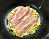 A picture of step 6 of Japanese pork and cabbage okonomiyaki (Butatama 豚玉お好み焼き).