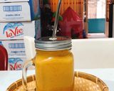 Hình bước làm 2 của món Sinh tố xoài mix cam & hạt