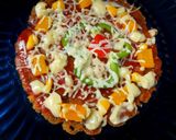 A picture of step 3 of Leftover upma pizza.