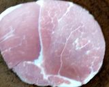 A picture of step 1 of My Muffin with Gammon, Pineapple + Poached Egg on Spinach.