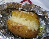 A picture of step 4 of Baked Potatoes with Manchego Cheese and Tzatziki.