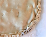 Foto del paso 3 de la receta: Empanada/torta de masa brisa rellena de nutella y nueces