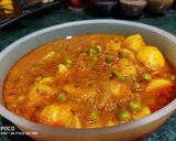 A picture of step 4 of Peas potato curry.