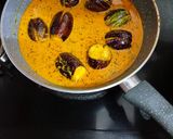 A picture of step 5 of Stuffed brinjal masala.