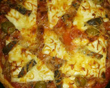 Foto del paso 9 de la receta: Pizza de atún y anchoas "Sábado noche"