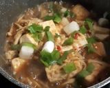 Foto langkah ke 7 dari resep Tahu dan Jamur Enoki Saos Tiram.