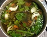 A picture of step 1 of Chicken stock with leftover chicken bones.