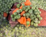 A picture of step 4 of Yakhnet Bazella - Lebanese green peas stew.