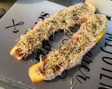 Une image de l'étape 7 de Courgette jaune farcie pancetta tomates emmental aux épices et origan (recette plancha).