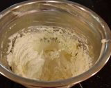 A picture of step 10 of Dark Chocolate Layer Cake with Fresh Strawberry Cream Frosting and Filling.