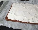 A picture of step 14 of Snickers Chocolate Roll Cake.