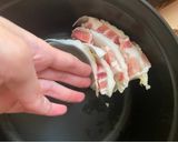 A picture of step 3 of Japanese mille feuille hot pot with pork belly and napa cabbage.