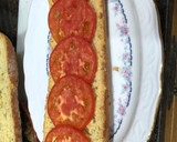 Foto del paso 7 de la receta: Bocadillo de tortilla de patatas con pimiento y cebolla
