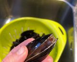 A picture of step 8 of Spicy fish + mussel tomato stew.