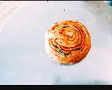 A picture of step 4 of Tasty crisp soft Laccha Paratha with kasuri methi and sesame seeds.