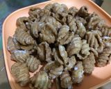 A picture of step 11 of Andhra Style Sweet Shells/Gavvalu.
