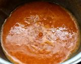 A picture of step 4 of Southern Thai Sour Curry with Salmon Head and Pickled Bamboo Shoots.