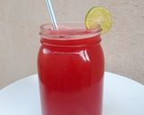 A picture of step 2 of Orange and Watermelon juice.